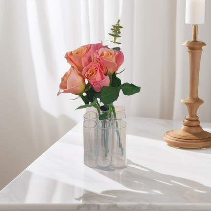 A set of 9 connected tube vases