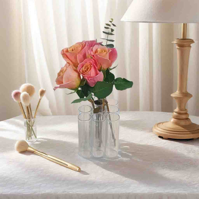 A set of 9 connected tube vases