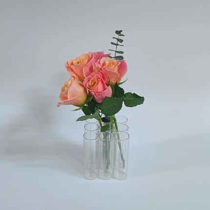 A set of 9 connected tube vases