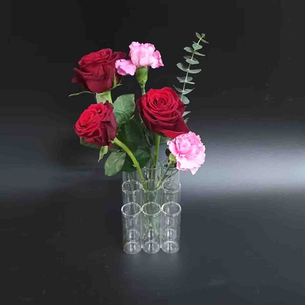 A set of 9 connected tube vases